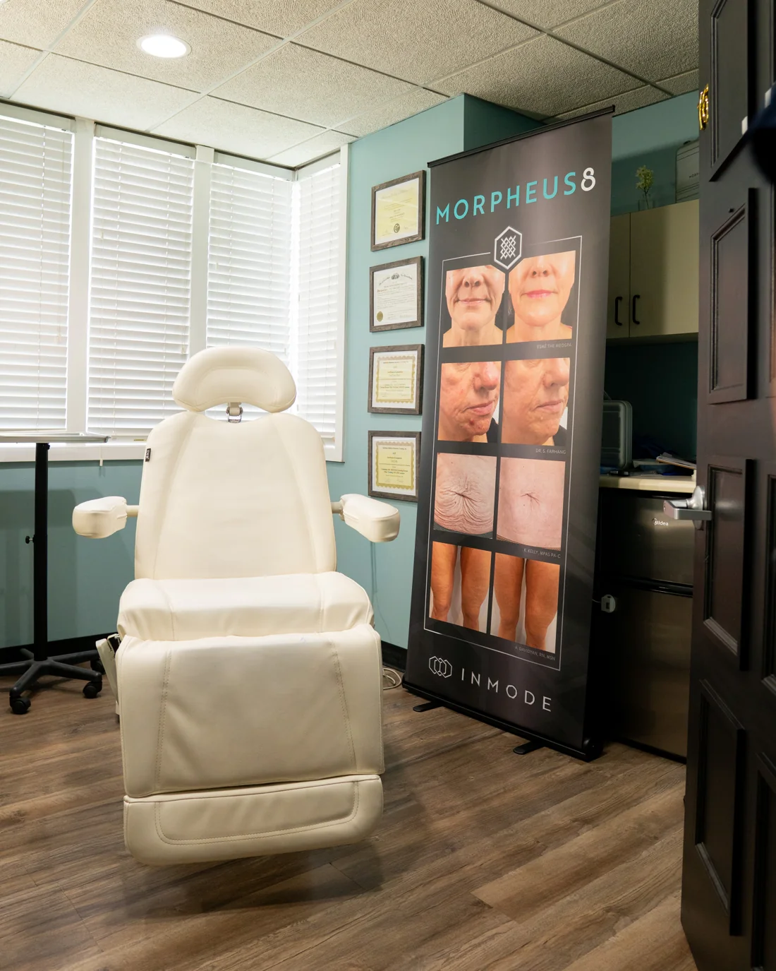 Treatment room at Pure Aesthetics Medical Spa with a reclining chair and Morpheus8 display